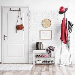 Modern hall interior with hanging clothes